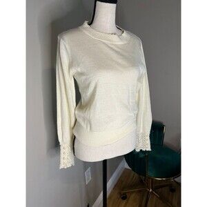 Earth music and ecology sweater. Fits US XS